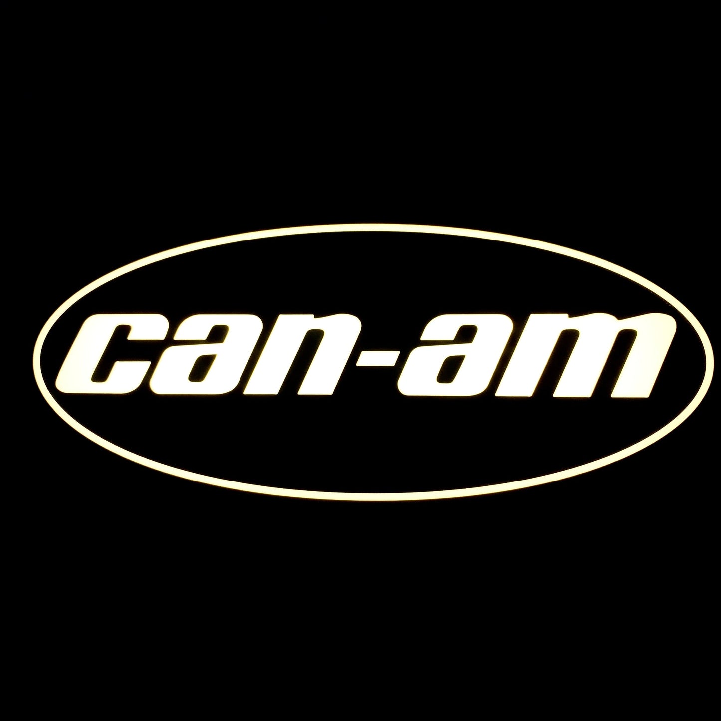 Can-Am led sign lit up in white on a black background