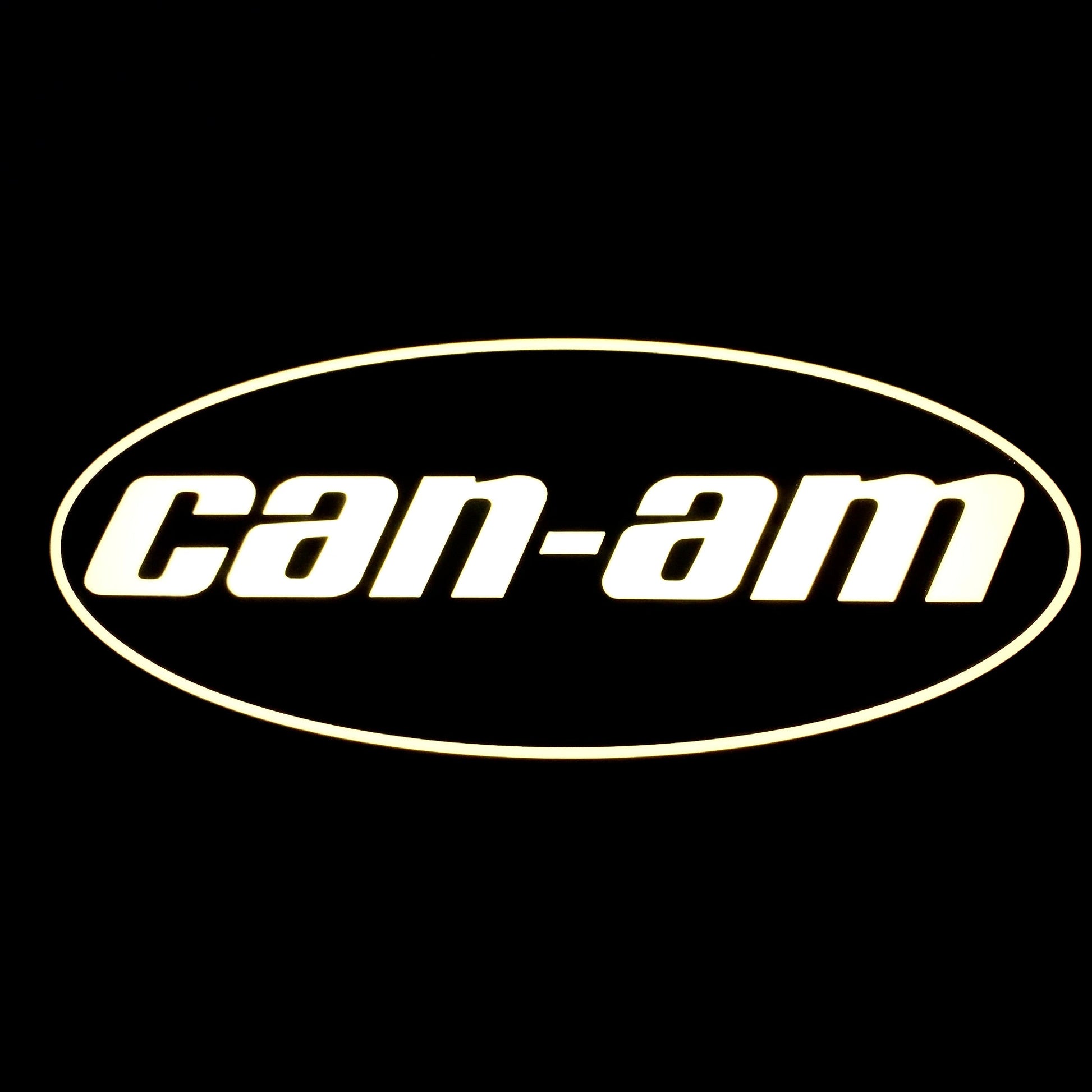 Can-Am led sign lit up in white on a black background
