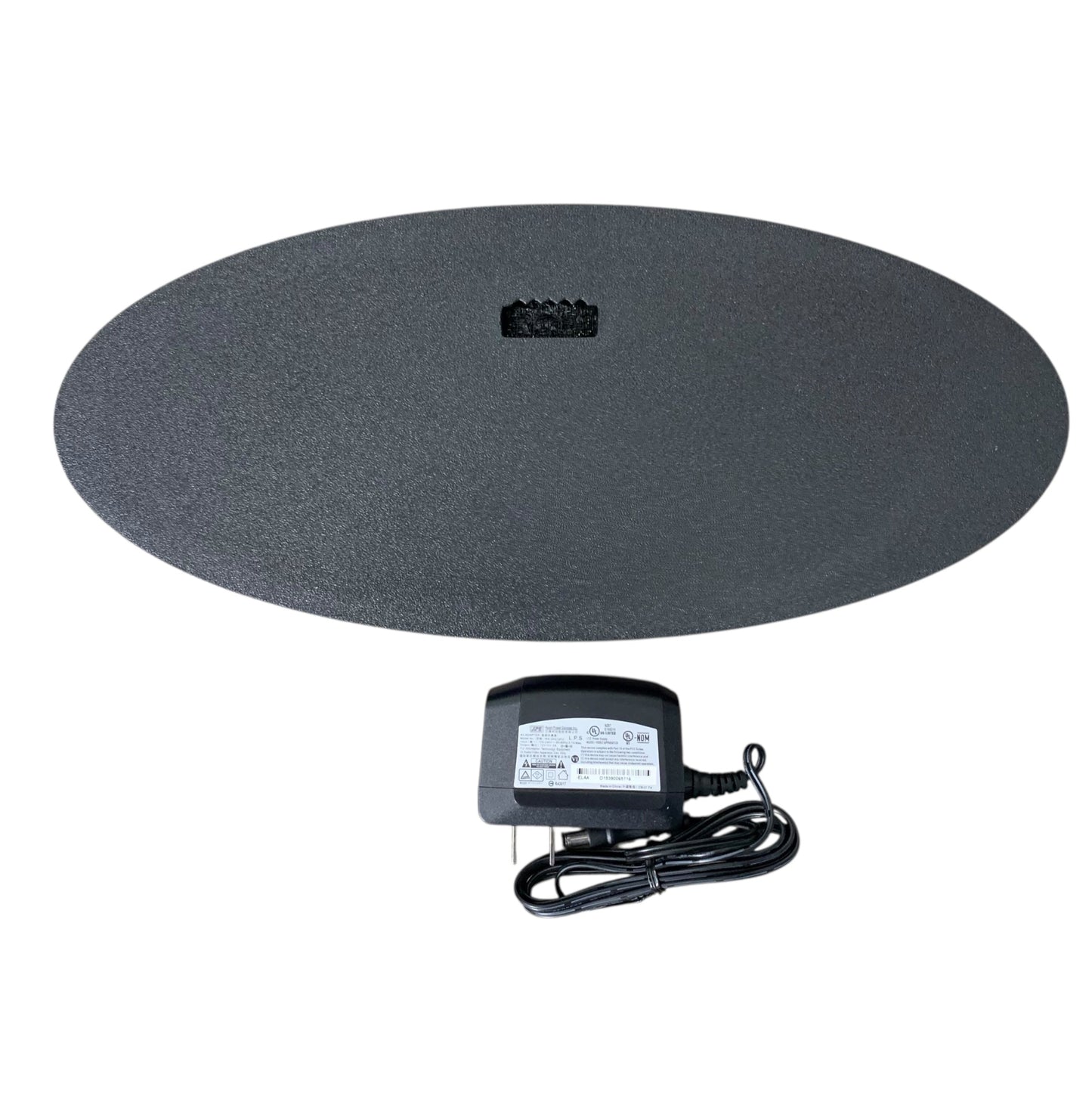 Back of a LED indoor sign with a power adaptor