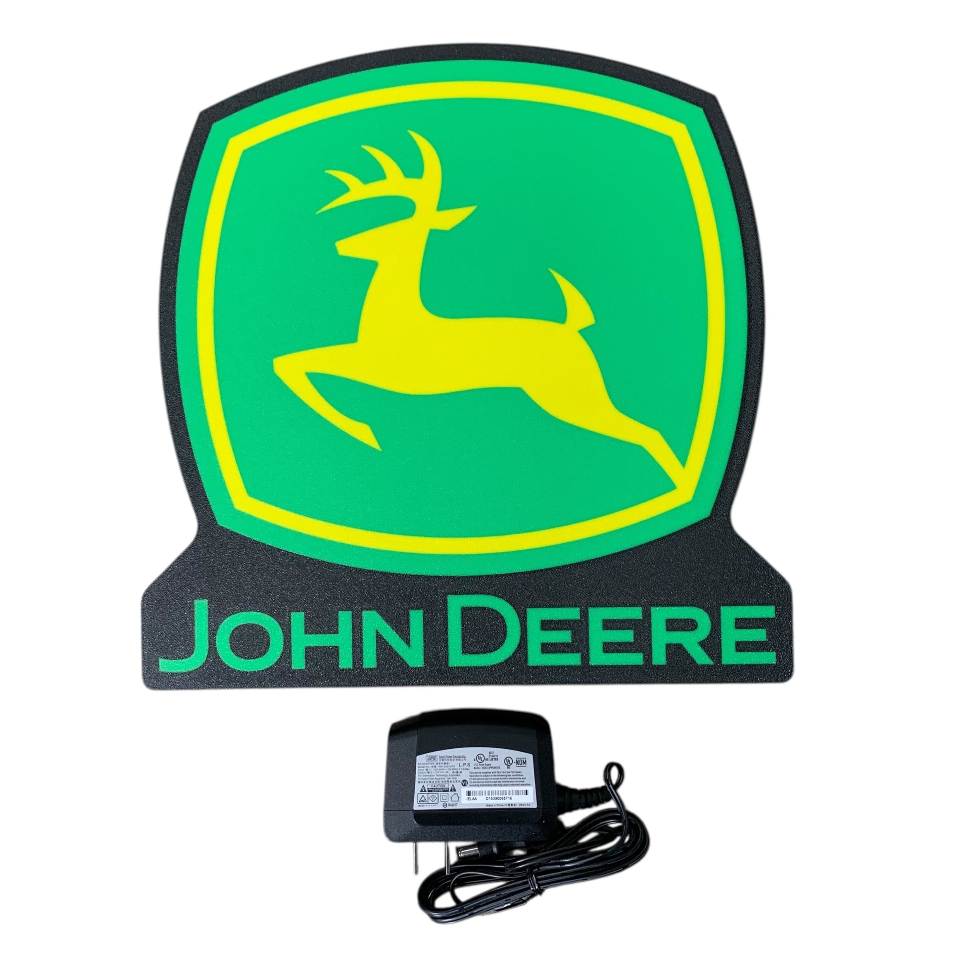John Deere led indoor sign with a deer silhouette on a green background, accompanied by a power adapter.
