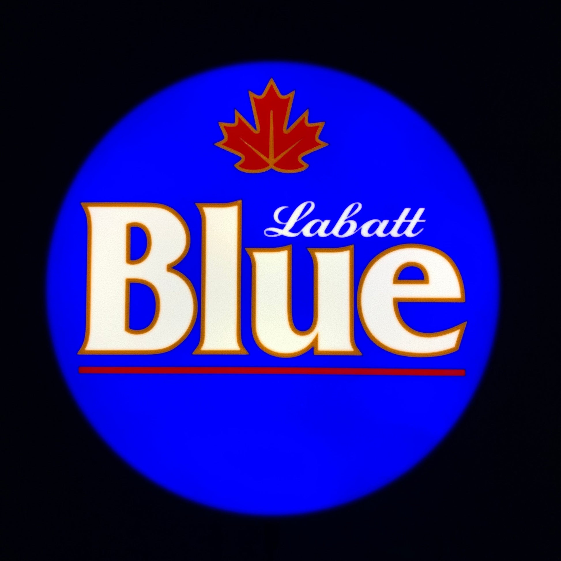 Labatt Blue logo with a red maple leaf on a blue background on a led indoor sign