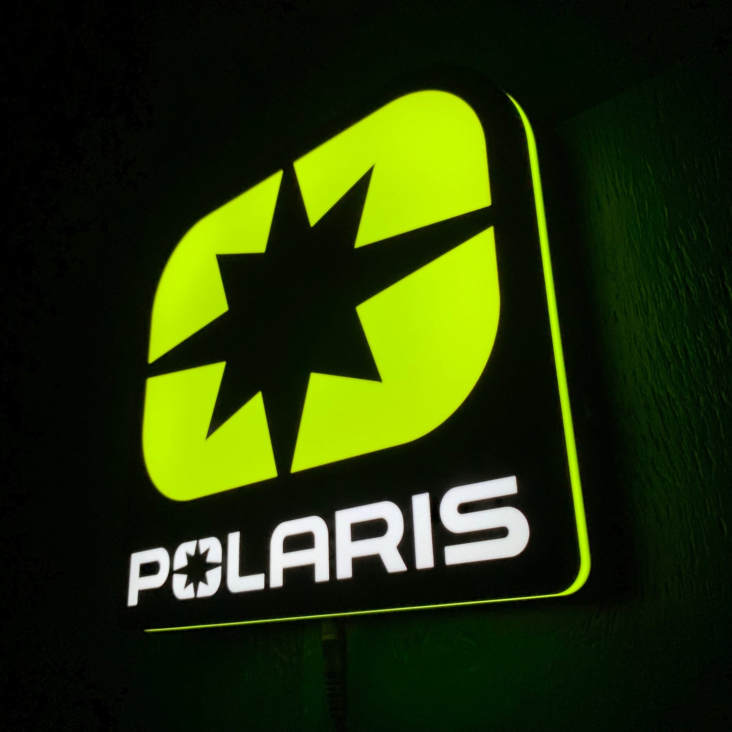 Polaris led indoor sign on a dark background