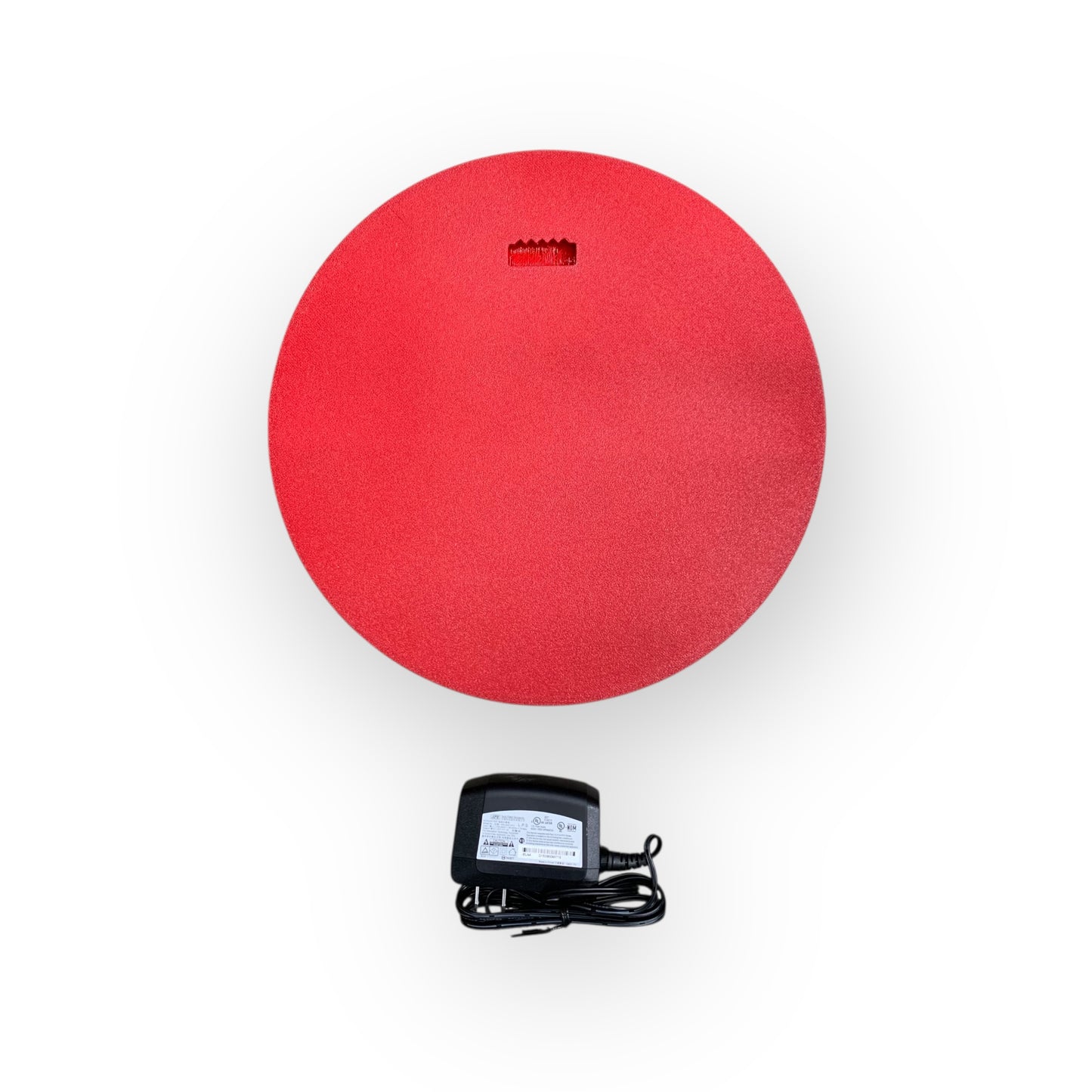 Back of a led indoor sign on a white background with a power adaptor