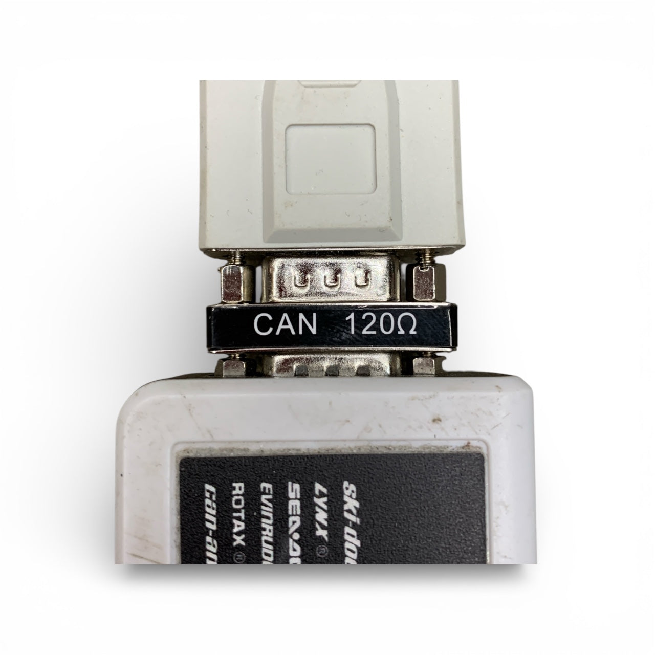 Close-up of a 120Ω CAN bus adapter on a white background