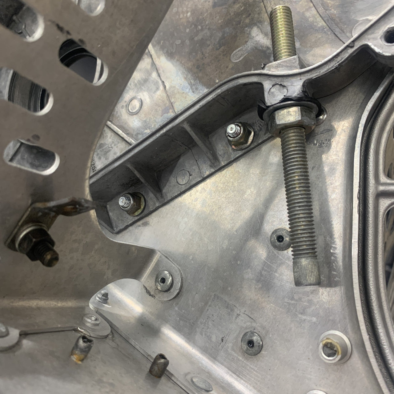 Ski-Doo XP Chain Case Mounting Plate 518325816 installed front side view