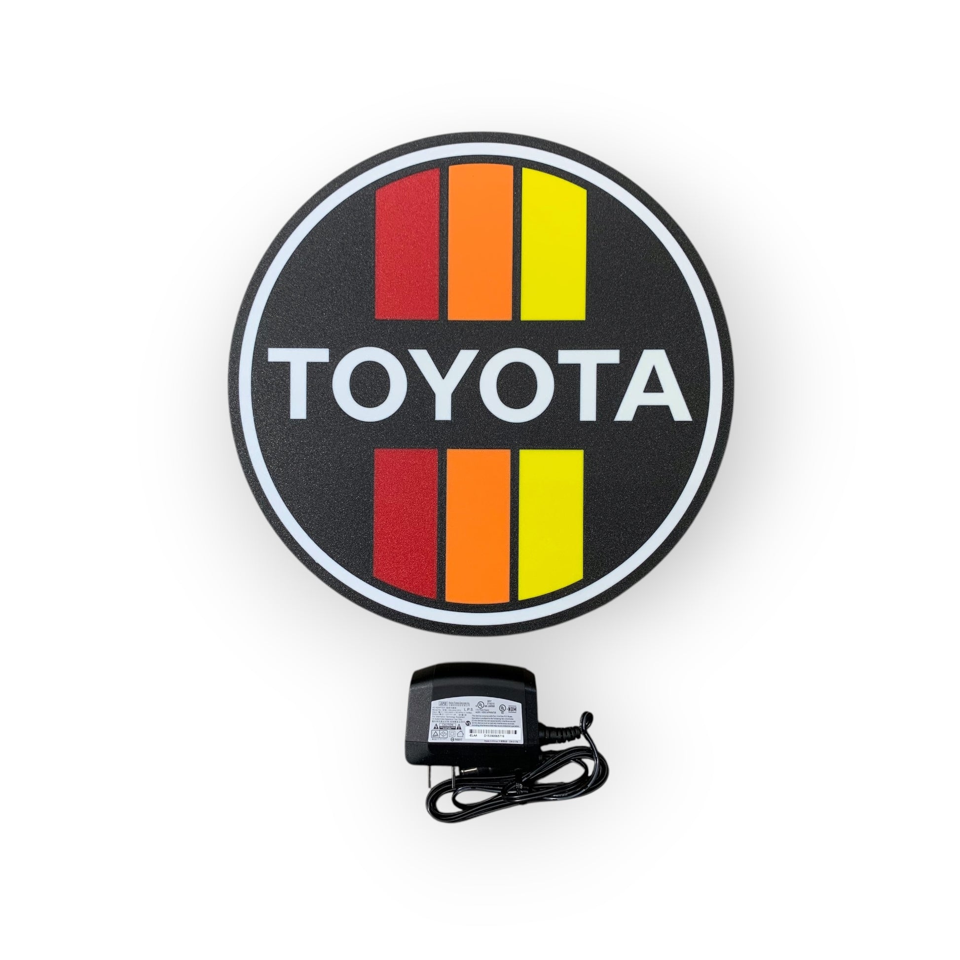 Toyota led indoor sign with power adapter on a white background