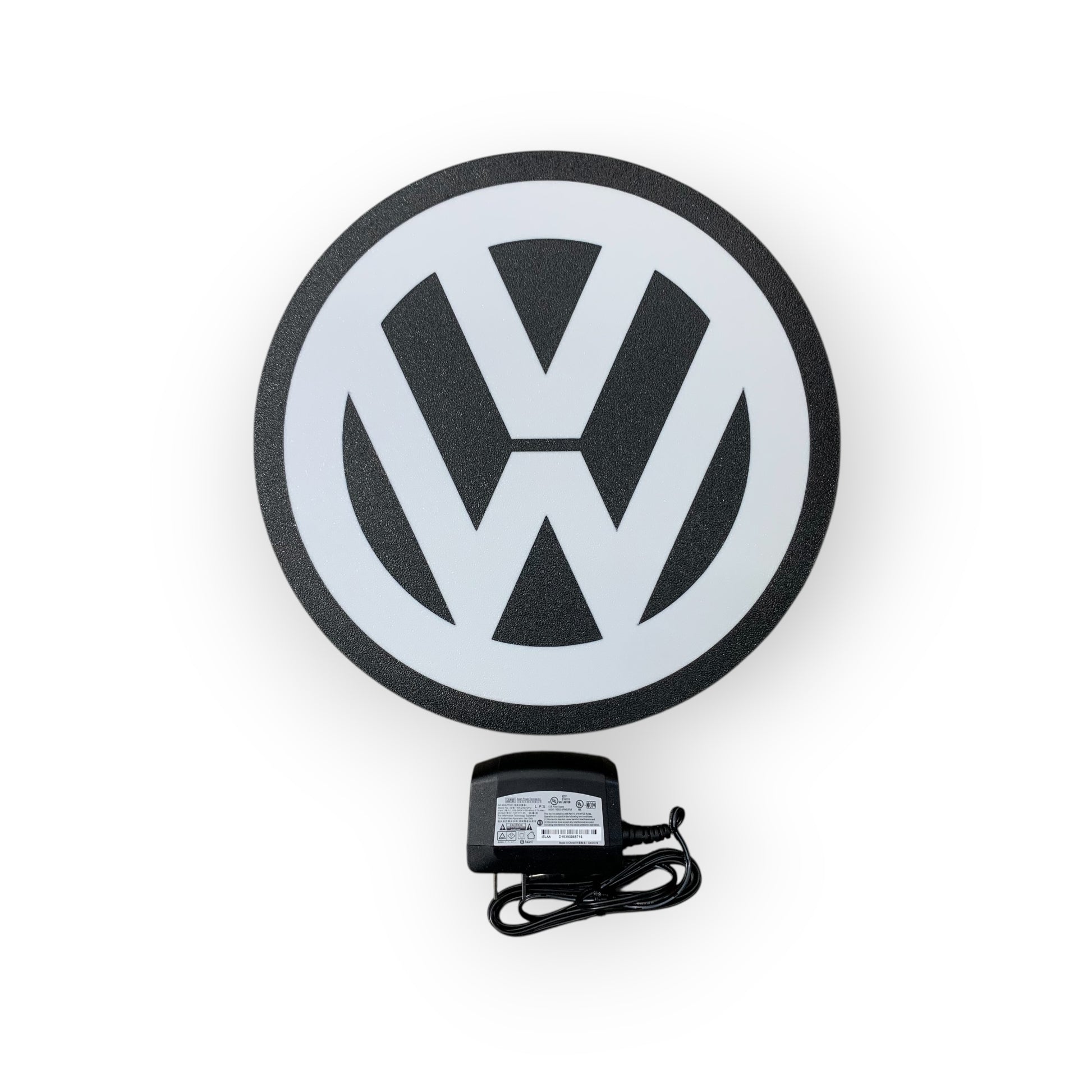 Volkswagen logo on a white background on a led indoor sign  with a power adapter.