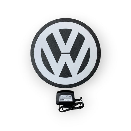 Volkswagen logo on a white background on a led indoor sign  with a power adapter.